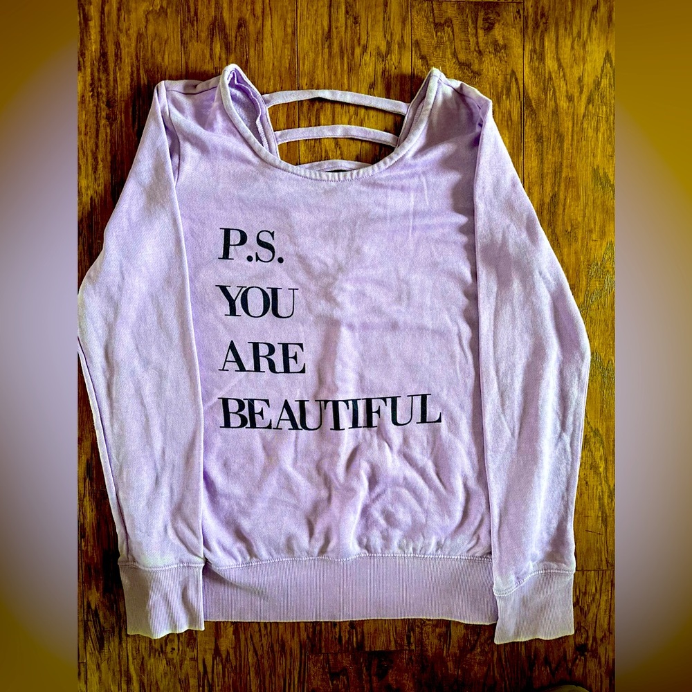 Light purple sweater. Size medium.